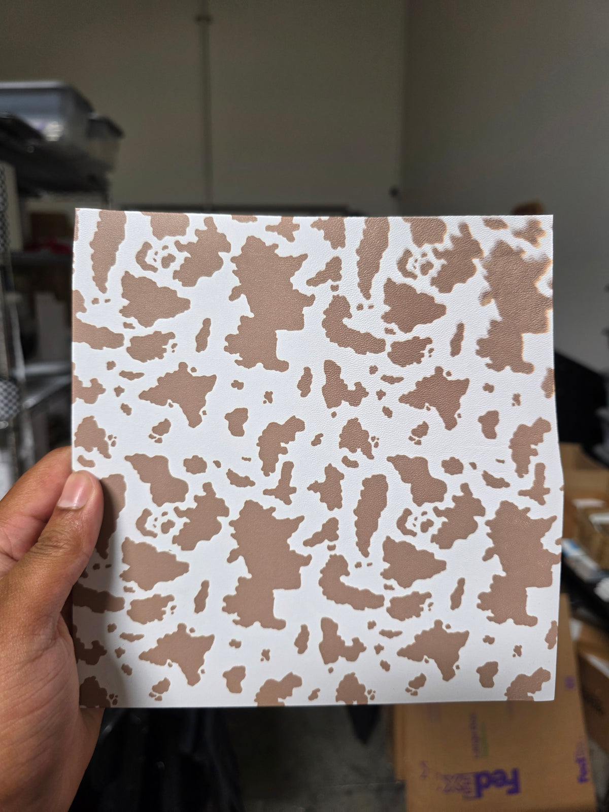 Brown cow (slightly warped and faded in corner)