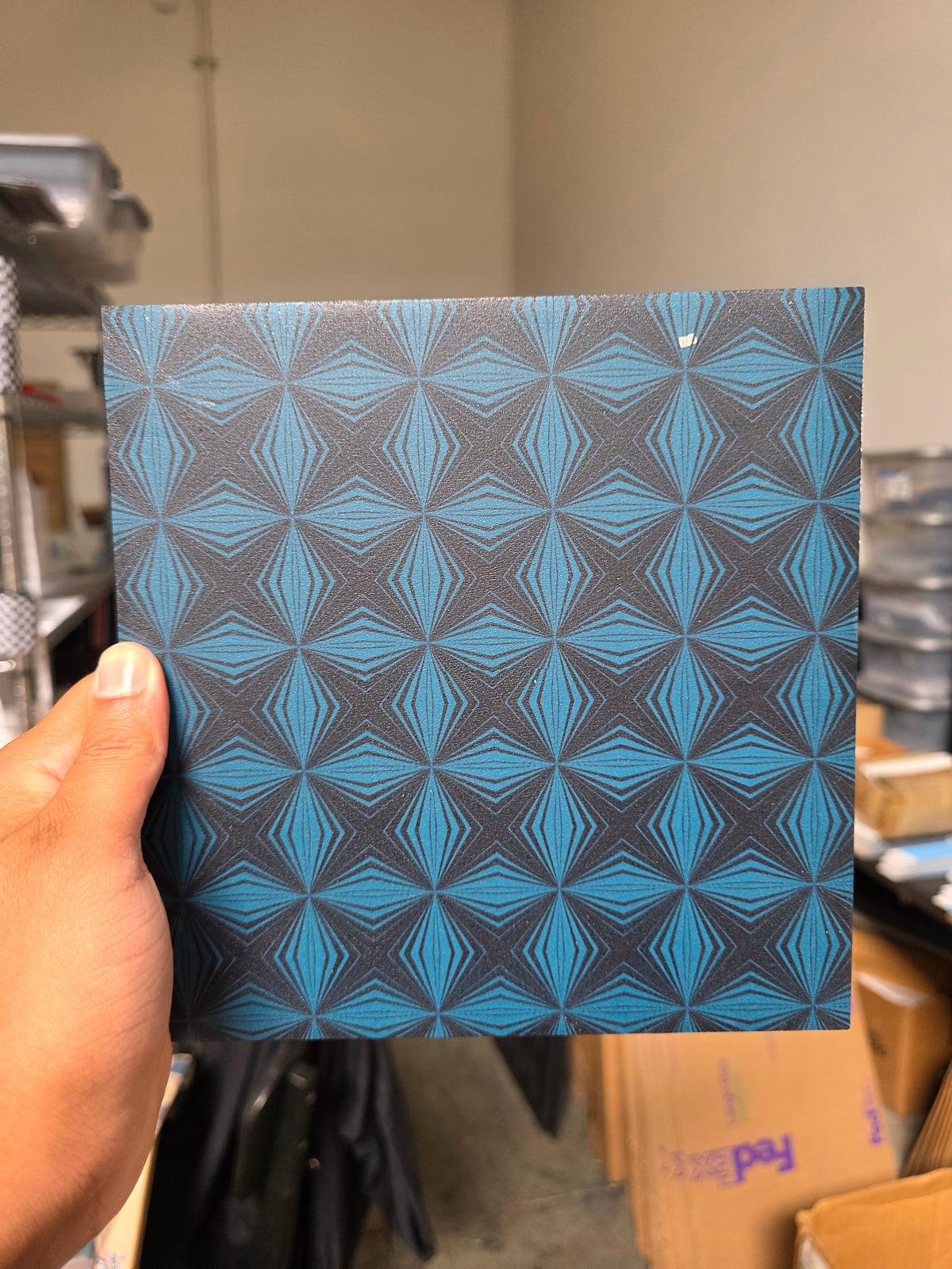 Geometric pattern (small debris in print)